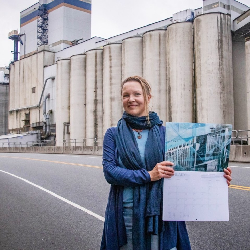 Kathleen Ainscough holding her artwork