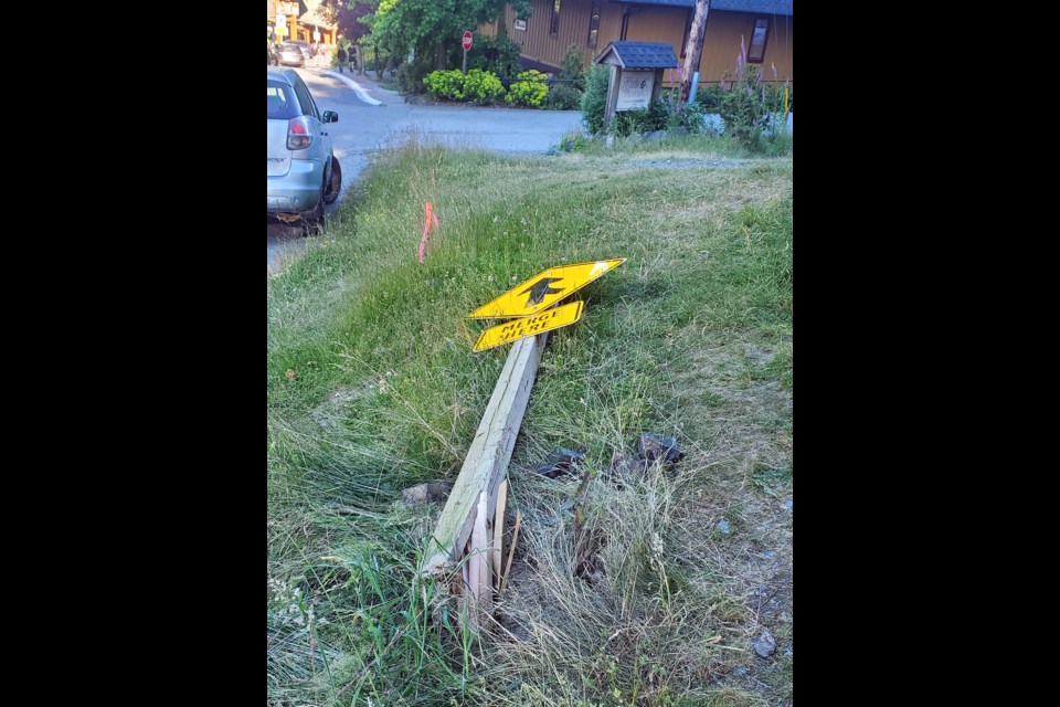 The merge sign on Bowen Island Trunk Road was run down Canada Day evening. 