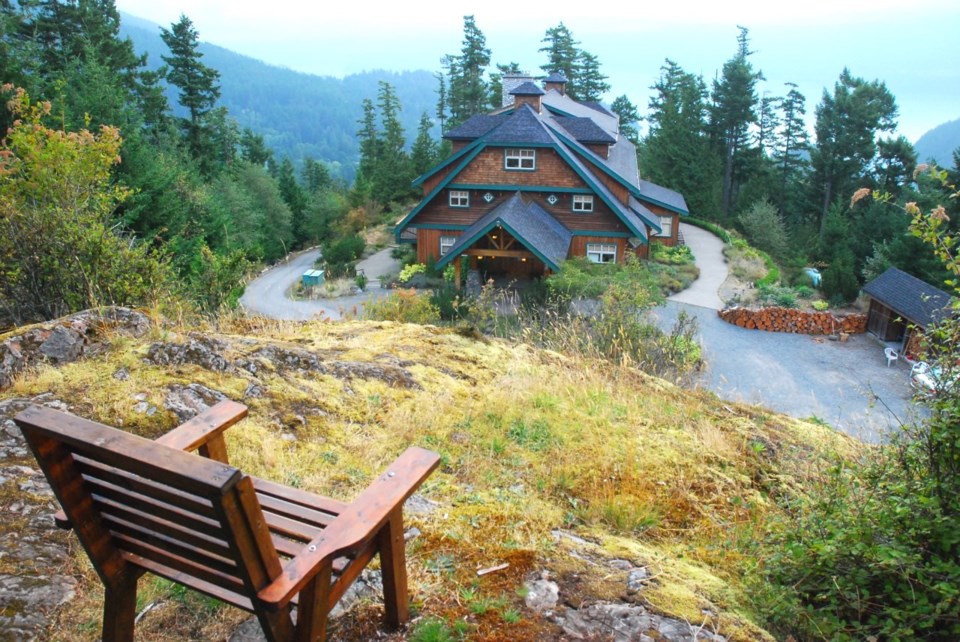 A bench overlooking the lodge on Cates Hill