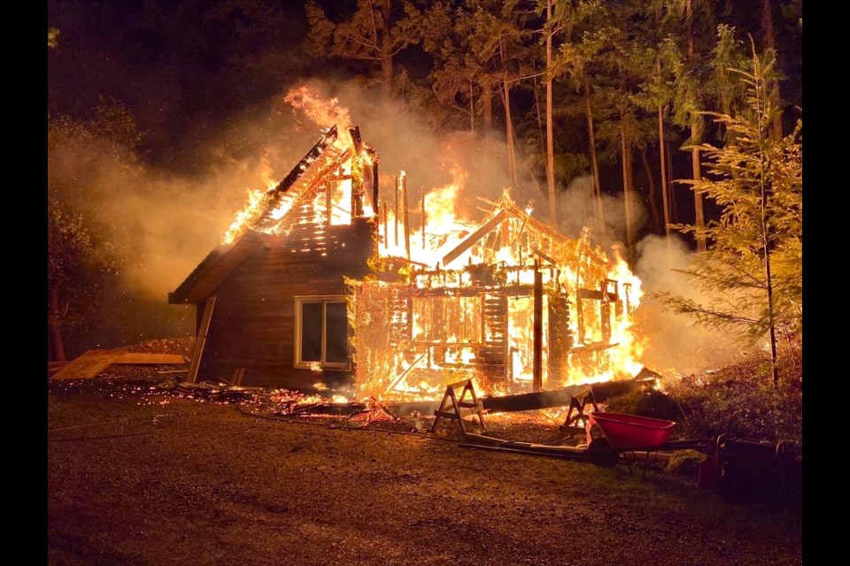 A cabin under renovation burned to Saturday, Oct. 9, 2021 – Thanksgiving weekend. BIM fire chief Aaron Hanen captured this shot