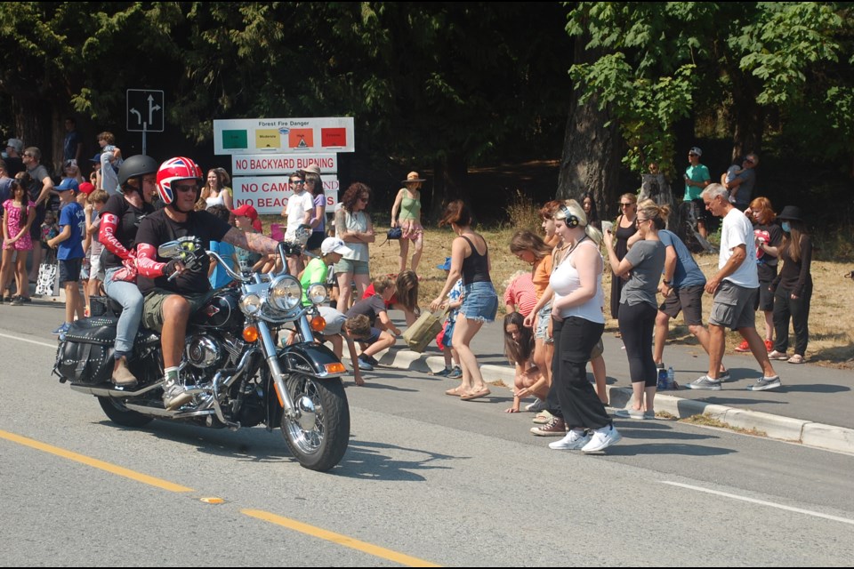 The Bowfest Parade began Saturday afternoon. As always many participants had their candy ready to toss to kids in the crowd. 