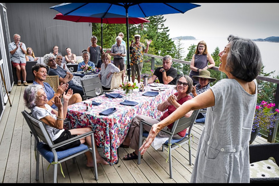 Rosemary addresses the crowd of friends gathered at a waffle party in late July 2021 to celebrate her geophysics award. 