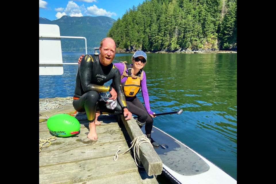 Michael Henrichsen and partner/safety marshal Jennifer
Henrichsen circumnavigated Bowen Island helping to raise record funds for SwimBowen.