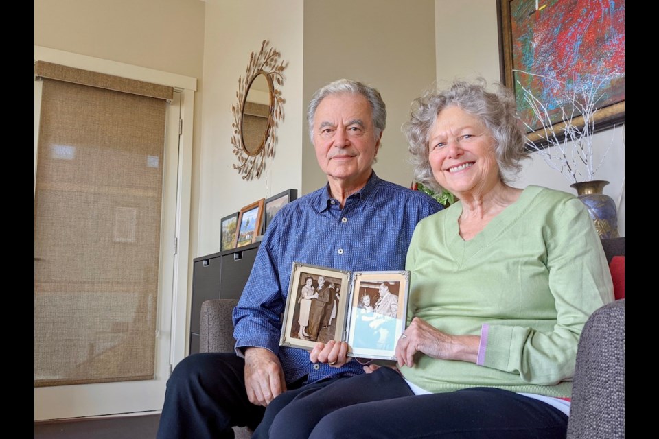 “Fear was in the air that we breathed in our house,” says Jack Resels who, like his wife Soorya Ray Resels, is the child of Holocaust surviors. It was on Bowen that they found an unexpected connection to a Jewish community. Seen here at their Belterra home with the photos of their parents – David Resels and Mania Krafchik; and Leon and Betty Kamay.
