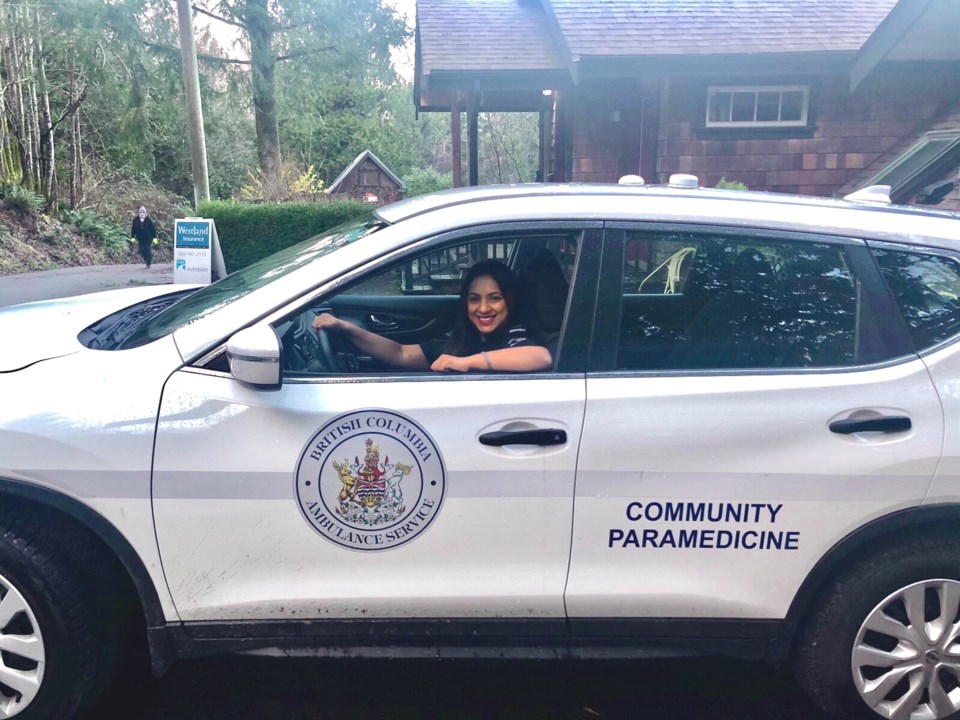 Kristine Kumar in the community paramedic vehicle