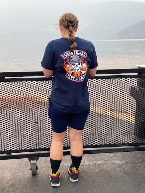 Makena Coker in her Bowen Island Fire Rescue T-shirt