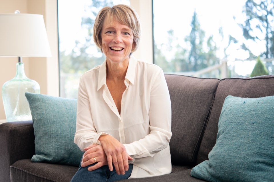 Mary Letson sitting on a couch