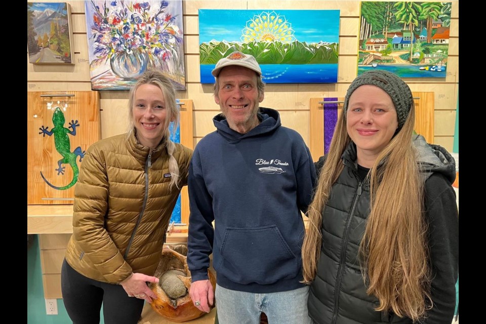 January’s featured artist Tony Mainwaring with fellow artistic daughters Chelsea and Katie.