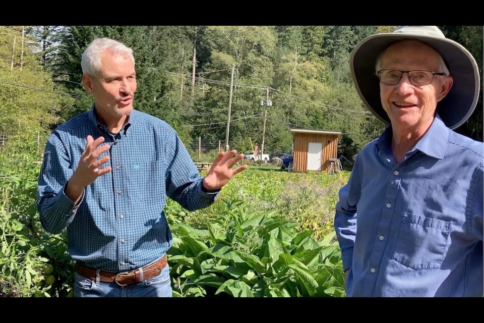 Doug Elliott learns about regenerative gardening and water conservation from Phil Gregory.