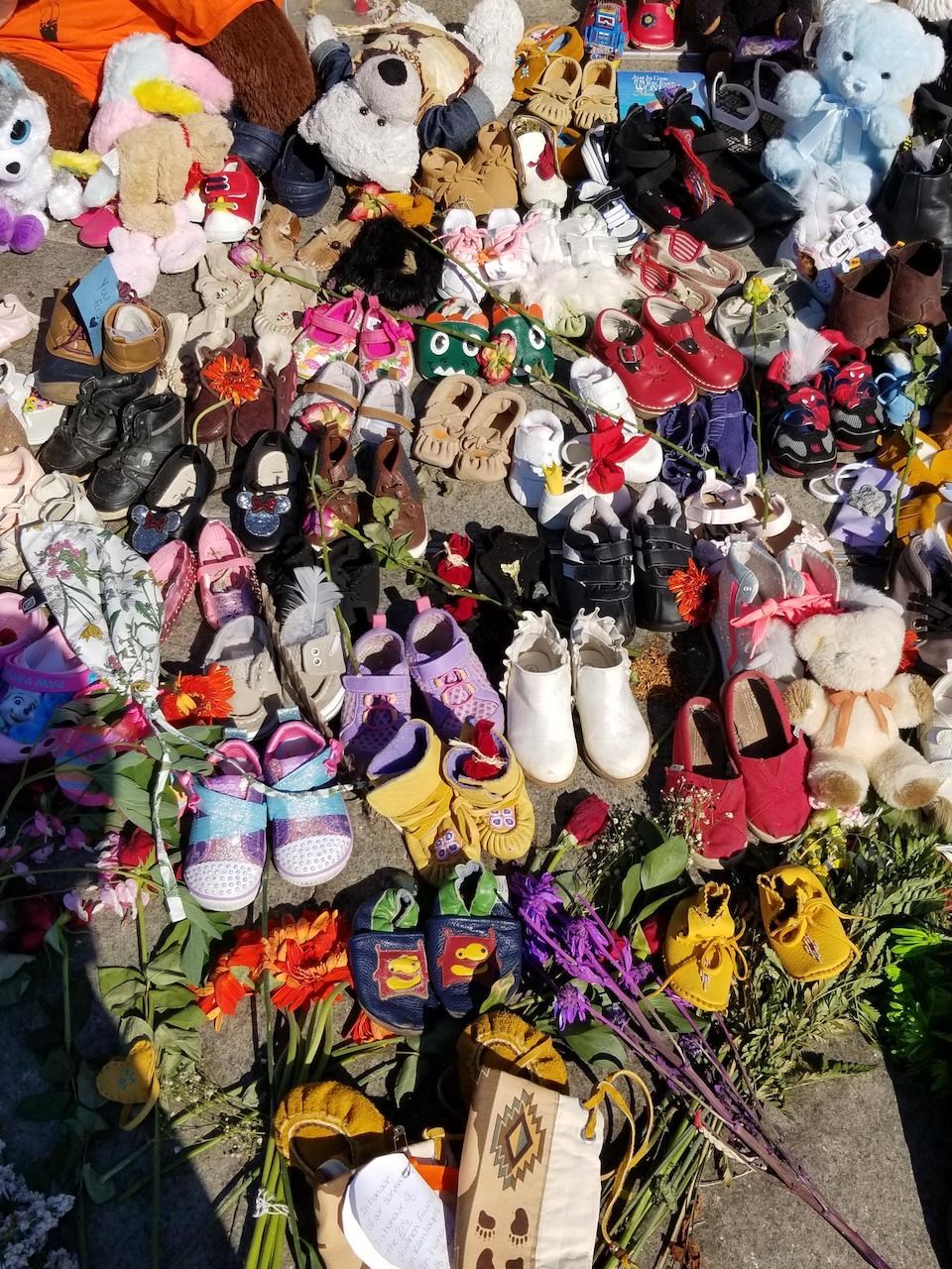hundreds of shoes at the memorial at Parliament Hill