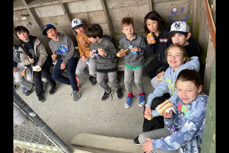 Both kids and adults rallied for a thorough cleanup effort of the Snug Cove baseball field this month in anticipation of the new season ahead. Once the hard work was over, there was plenty of time for some fun (and snacks) around the bases too.