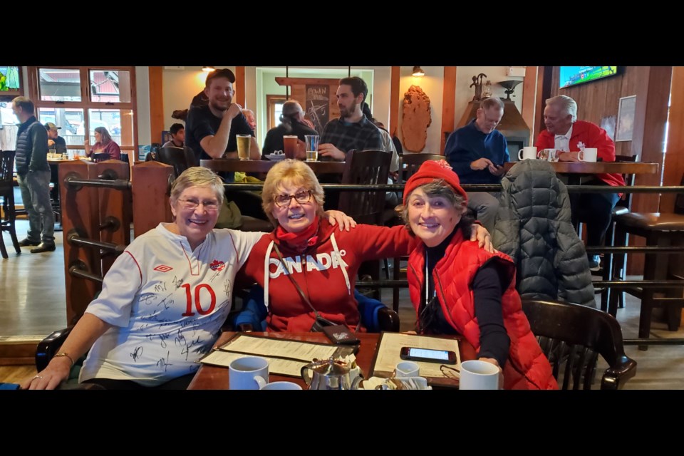 Alice Jennings, Bev Lindsey, and Pat Adams (L-R) had prime seating for the Pub's projection screen. 