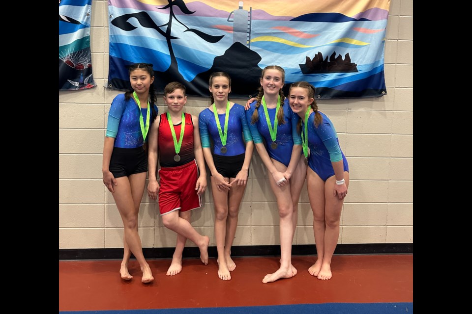Local high school gymnasts (L-R) Juha Park, Kian Bristowe, Mischa LaRoche, Sophia Toews, & Clara Patterson were particularly successful at the event.