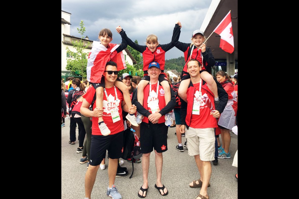 Bowen gymnasts carried the Team Canada flag at opening ceremonies during the 2019 Gymnaestrada in Austria. 