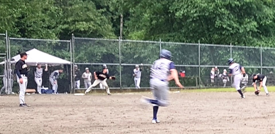 Players at the baseball diamond