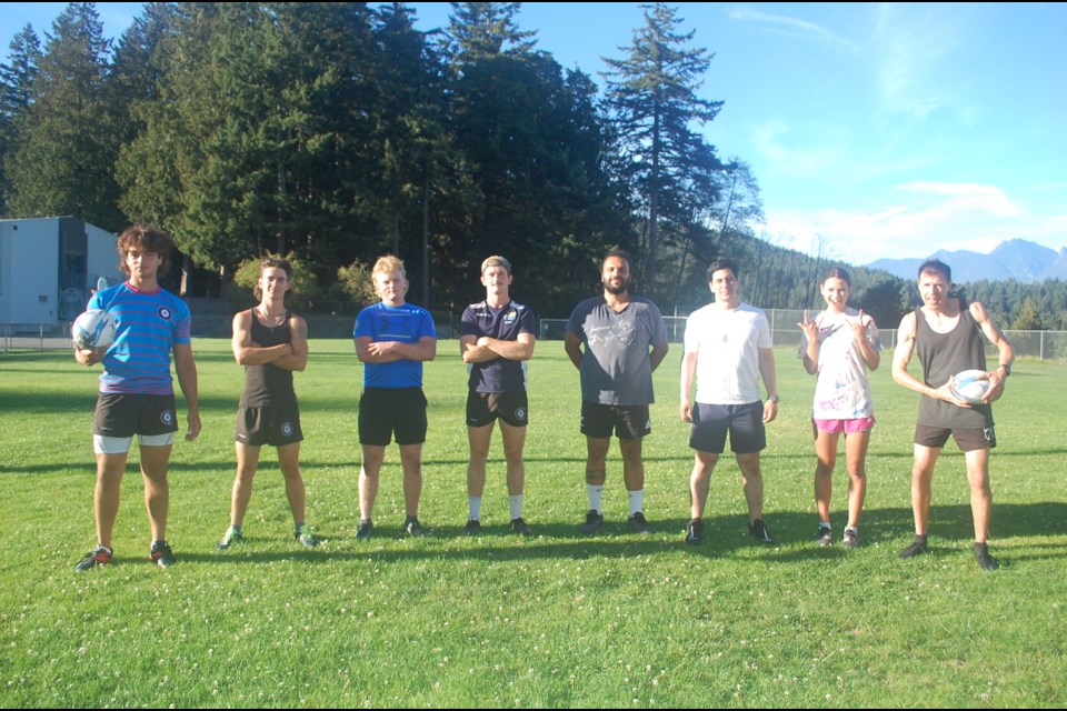 Some of the Bowen rugby squad ready to play earlier this month, including organizer and passionate rugby fan Mark Telfer (right). 