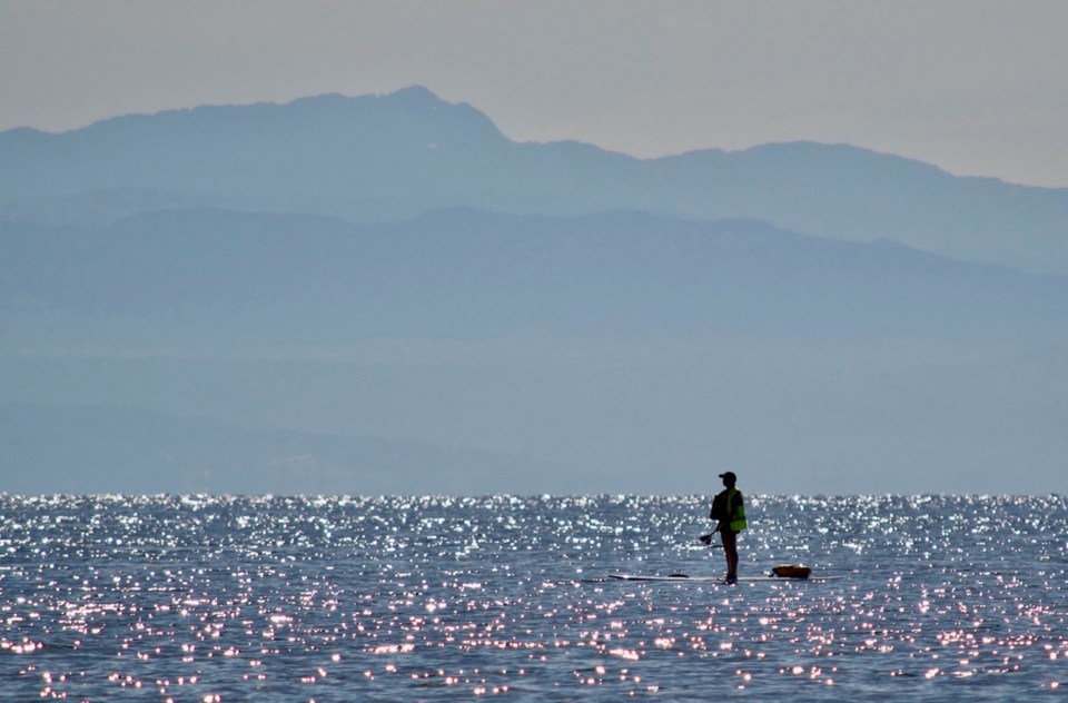 Woman on a Standup paddleboard at SwimBowen 2019