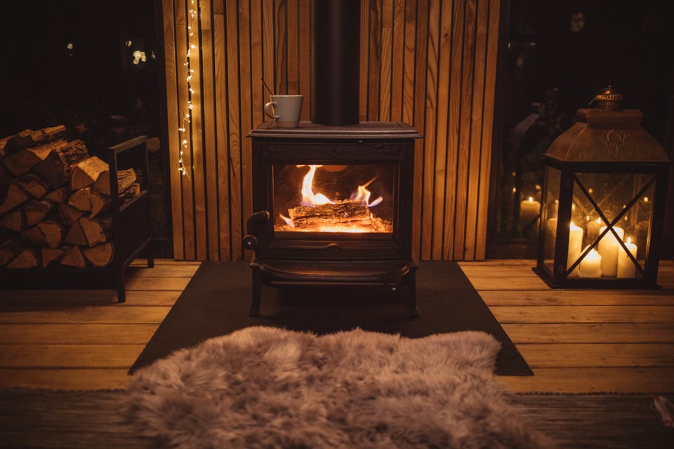 Cozy living room winter interior with fireplace