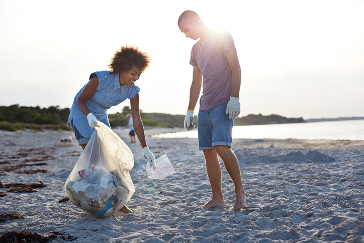 People cleaning up a beach