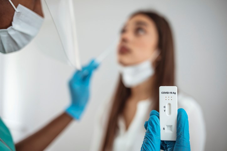 Woman getting a rapid test done