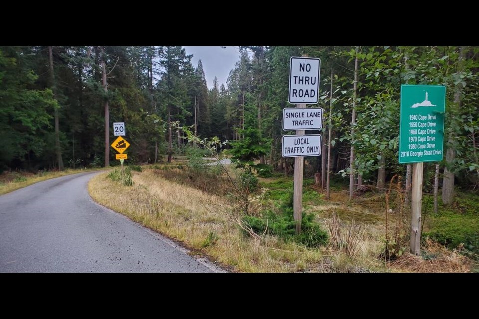 Metro Vancouver’s Cape lands (left) and the Conservancy’s Wild Coast Nature Refuge (right) sit across the road from each other along Huszar Creek Lane. 