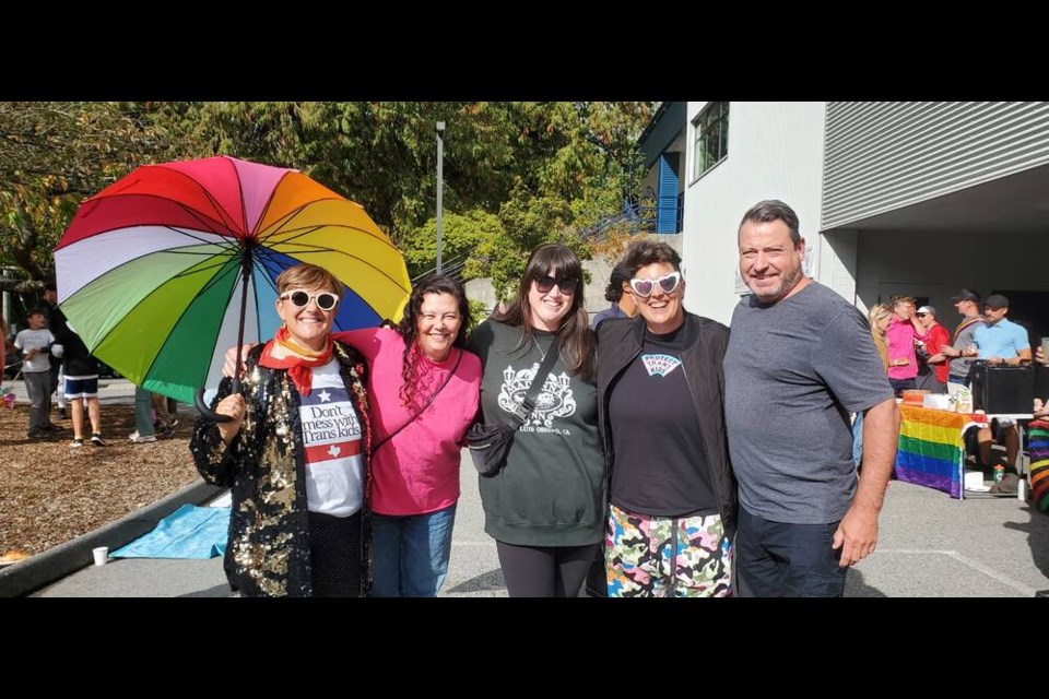 It may have been on short notice, but a peaceful protest supporting the LGBTQ2S+ community still drew a crowd at Bowen Island Community School on Sept. 24. This included (L-R) Jen Harvey, Sarah Yu Rutherford, Tara Forshaw, Leah Gregg (who also served as event emcee), and Todd Rutherford. 