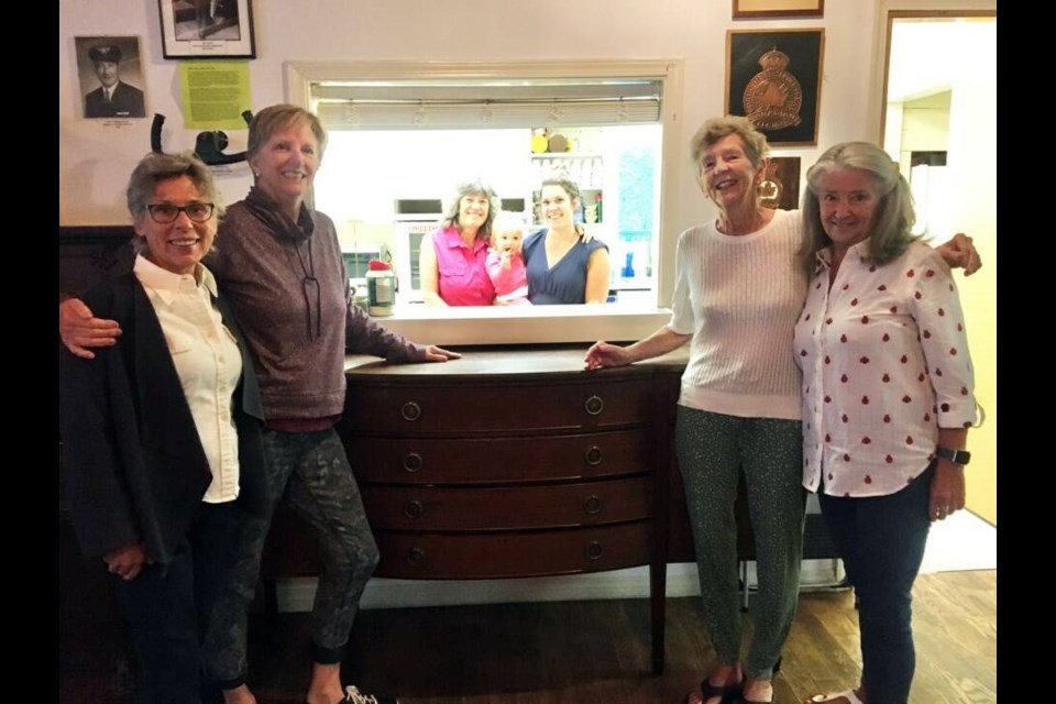 Colleen O’Neil (second from left) with organizers from a Community Lunch at the Bowen Island Legion. 