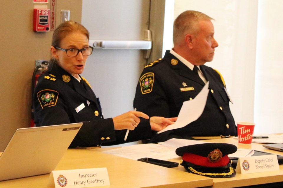 South Simcoe Police Deputy Chief Sheryl Sutton, left, provided the monthly operational and financial updates for June during the police services board meeting at the Innisfil Town Hall on Wednesday.