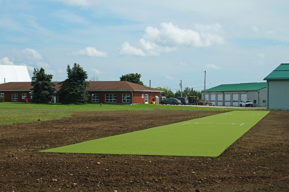 Expected to open in September, the concrete pad and pitch turf are already installed, with the surrounding field just waiting on sod at Bradford’s first cricket field at Joe Magani Park on Tuesday, Aug. 8, 2023.