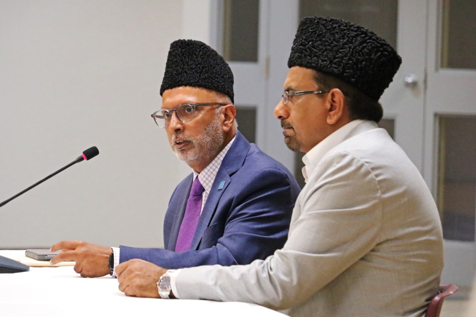 From left: Farhan Khokhar, vice-president of Ahmadiyya Muslim Jama’at Canada, and Mian Rizwan, chief executive of Jalsa Salana annual convention, address councillors during the council meeting Tuesday night.
