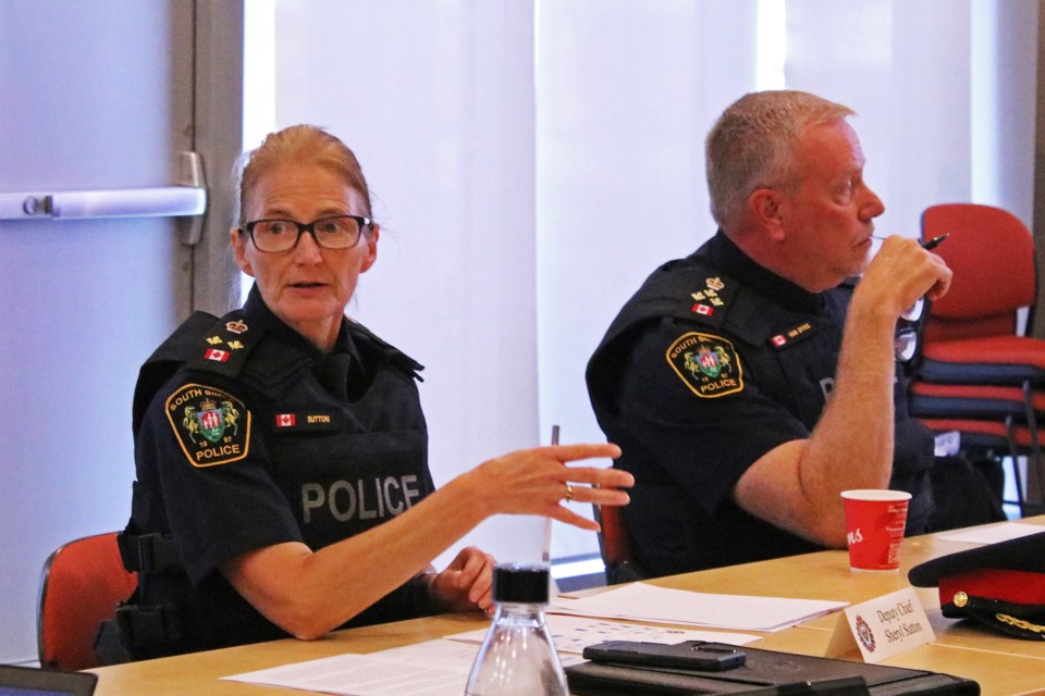 South Simcoe Police Service Deputy Chief Sheryl Sutton, left, speaks during the police services board meeting at the Innisfil Town Hall on Wednesday, Sept. 27, 2023.