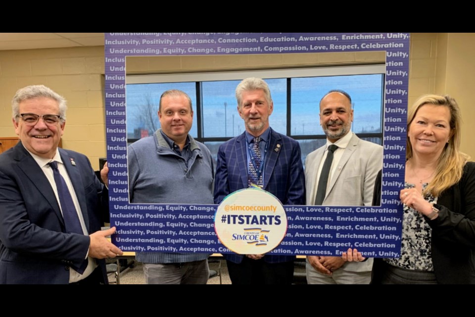 Members of the police services board (from left) Bradford Mayor James Leduc, Todd Canning vice-chair, Chris Gariepy chair, Sarbjit Singh and Innisfil Mayor Lynn Dollin are seen promoting the #ITSTARTS campaign in a post on the South Simcoe Police Service’s Facebook account from March 3, 2023.