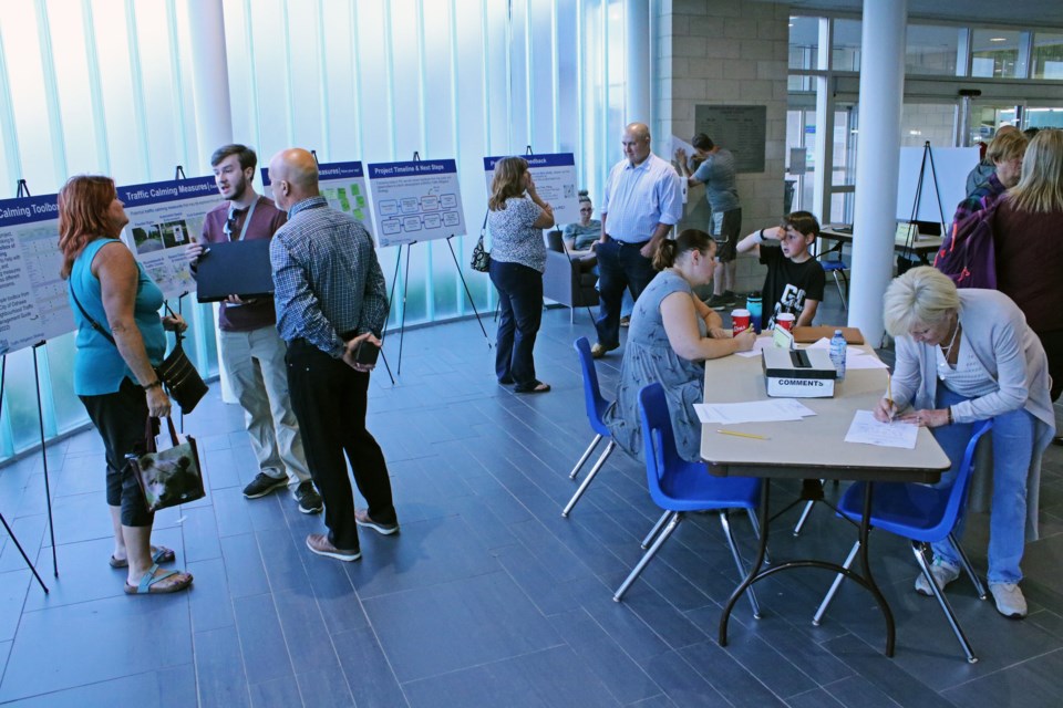 People gather to learn about and share their opinions of the new traffic mitigation strategy at the town’s first public information and consultation (PIC) meeting at the BWG Leisure Centre on Wednesday night.