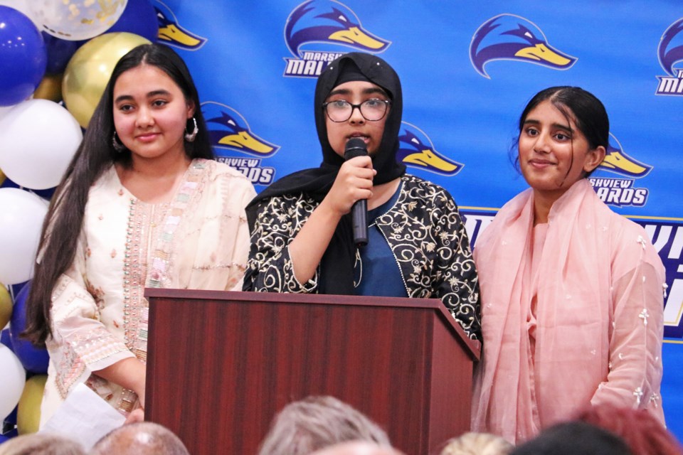 From left: Grade 8 students Maryam Sadehi, Meerab Mudassar and Maira Javed spoke about the the items added to the time capsule during the grand opening of Marshview Public School at 742 Simcoe Rd. in Bradford on Oct. 19.