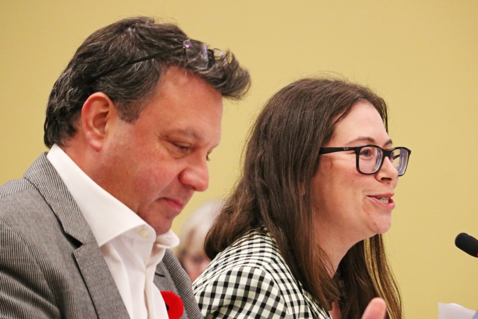 Michael Disano, the town’s manager of economic development (left), listens as Catherine Oosterbaan from Oosterbaan Strategy, speaks about the BWG Economic Development Strategy (2023-26) during the regular meeting of council Nov. 7.