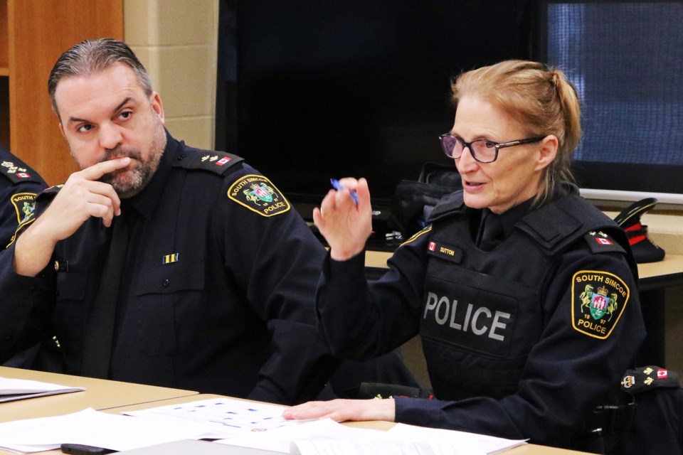 From left: South Simcoe Police Service Insp. Julio Fernandes listens as Deputy Chief Sheryl Sutton provides the monthly operational update for December during the police services board meeting at the South Division building in Bradford on Jan. 18.