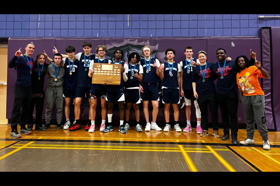 The Bradford District High School Bucs senior boys AAA basketball team are seen after winning the Georgian Bay Secondary School Association championship against the St. Peter's Catholic Secondary School Panthers in Barrie on Friday, Feb. 23.