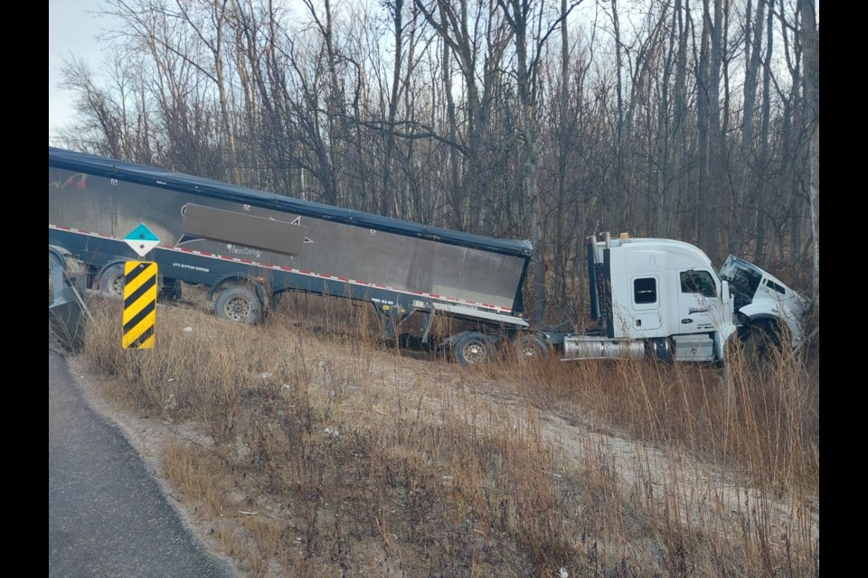 A tractor trailer snarled traffic on the northbound Highway 400, near Highway 88, in Bradford March 12. 