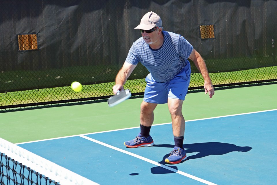 Allan Roitner plays pickleball on the outdoor courts beside the Danube Seniors Leisure Centre in Bradford on Monday, April 22.