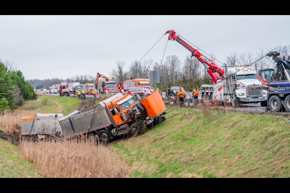 A dump truck crash caused quite a clean-up effort alongside Highway 400 in Bradford Monday morning.