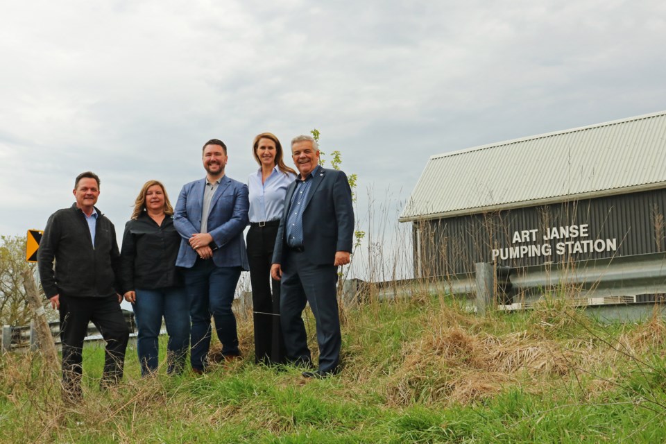 From left: Frank Jonkman, drainage superintendent; Jody Mott, president of the Holland Marsh Growers’ Association; Ward 2 Coun. Jonathan Scott; York-Simcoe MPP Caroline Mulroney and Mayor James Leduc gathered at the Art Janse Pumping Station in Bradford, where Mulroney announced $284,500 in provincial funding for projects to reduce phosphorus in the Holland Marsh and educate youth, on Friday, May 3.