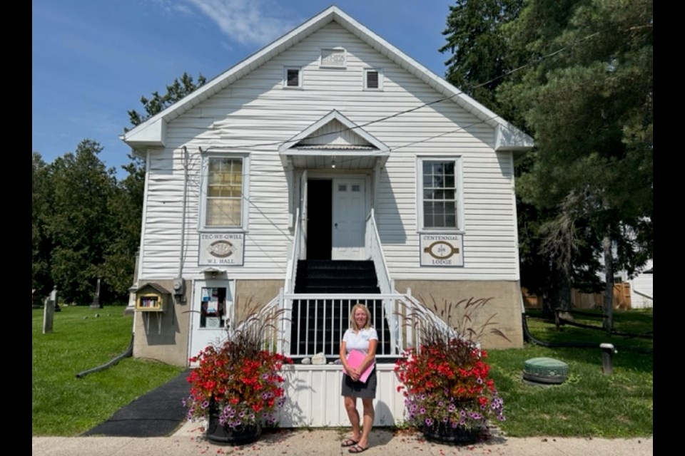 Liz Moore is shown in front of the Newton Robinson Hall, where the the Women's Institute holds its meetings and events.