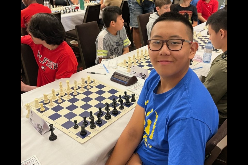 Ricky Chen volunteers at the BWG Library Chess club, and is shown here at the 2023 Canadian Youth Chess Championship in Calgary.