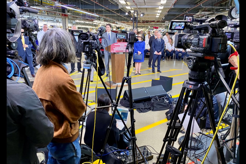 Prime Minister Justin Trudeau and a host of municipal, provincial and federal politicians were surrounded by media during Honda Canada's announcement of its new investment in the Alliston manufacturing facility.