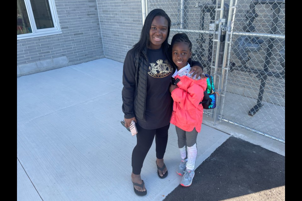 Donnette Junior with her daughter Brielle on her first day at Harvest Hills.