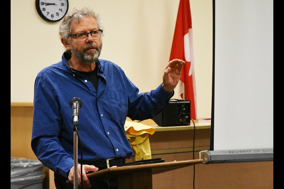 Dan Cooper, co-author of Gardening from a Hammock, talks about the 'low-maintenance garden' at a meeting of the Innisfil Garden Club. Miriam King/Bradford Today