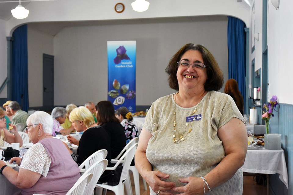 Lucy Valente, president of the Innisfil Garden Club, welcomes members to the Grange Hall. Miriam King/Bradford Today