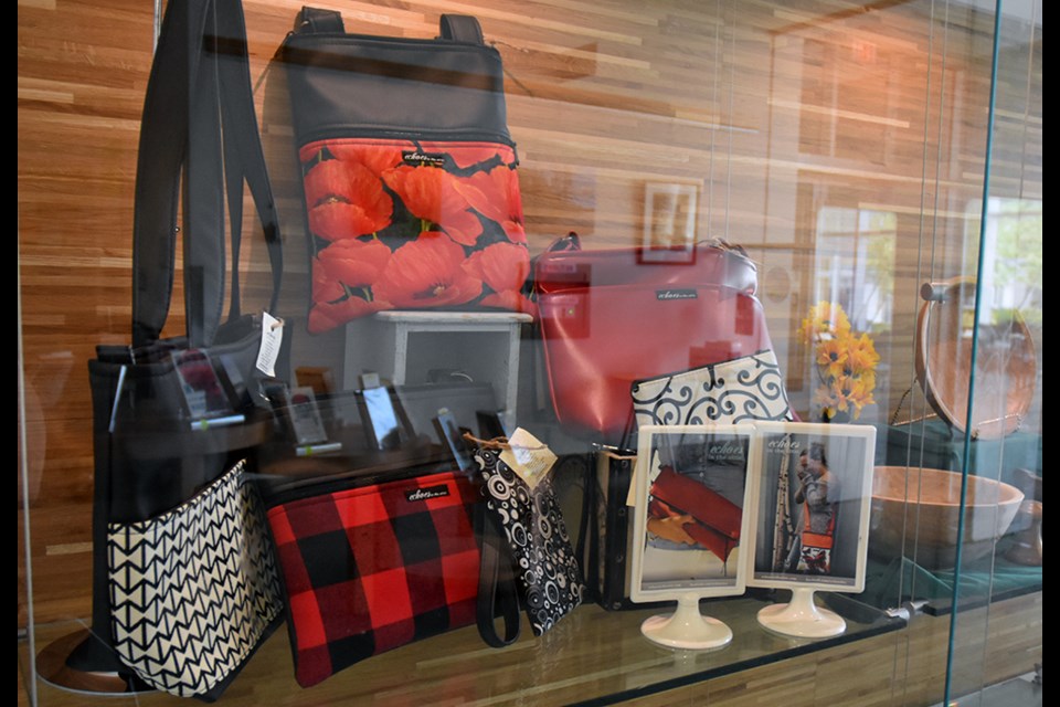 The upcycled bags and totes by Echoes in the Attic, on display at the BWG Public Library. Miriam King/BradfordToday