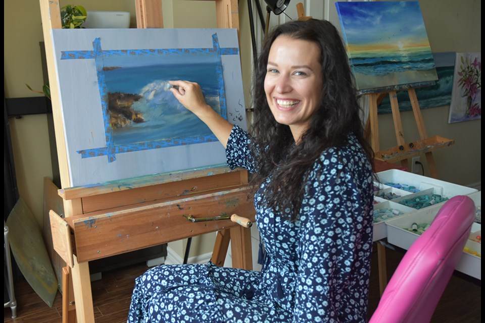 Maria Petrov works in pastels, in her home studio. Miriam King/Bradford Today