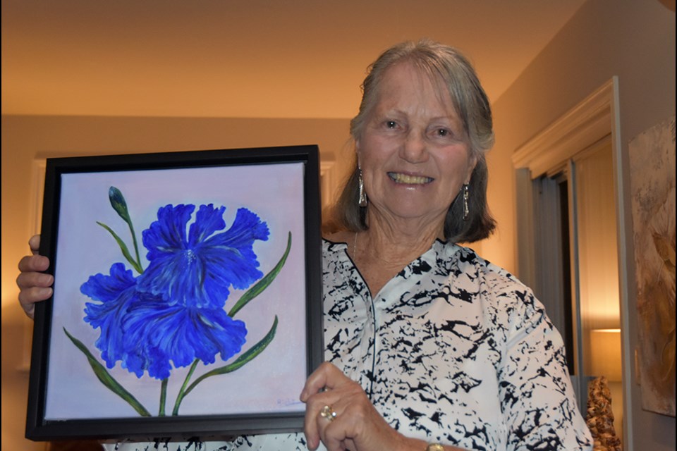 South Simcoe Palette Club member Richt Dodd, with painting. Miriam King/Bradford Today